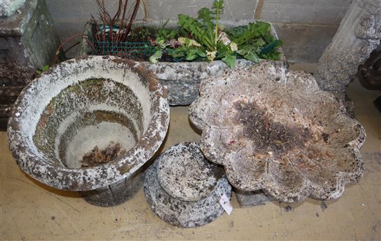 A reconstituted stone trough and five other items (a plinth, two urns, circular planter), planter width 74cm, depth 32cm, height approx